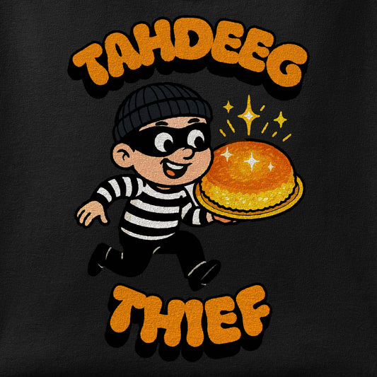 Close-up of the Tahdeeg Thief print showing ink detail on the fabric