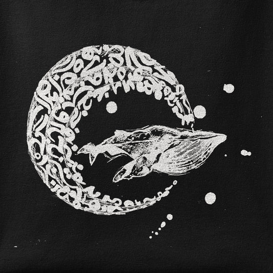Close-up of the Whale Journey print showing ink detail on the fabric