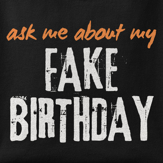 Close-up of the Ask me about my Fake Birthday print showing ink detail on the fabric