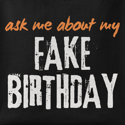 Close-up of the Ask me about my Fake Birthday print showing ink detail on the fabric