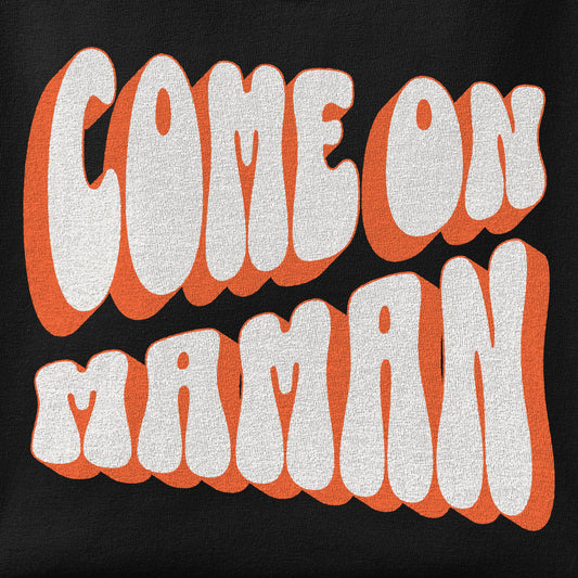Close-up of the Come On Maman print showing ink detail on the fabric