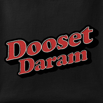 Close-up of the Dooset Daram print showing ink detail on the fabric