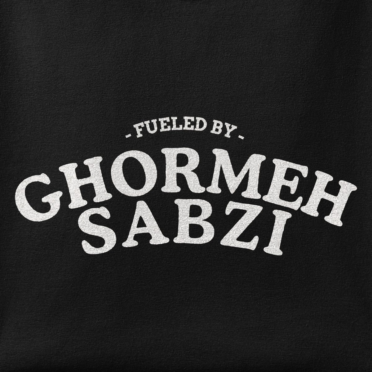 Close-up of the Fueled by Ghormehsabzi print showing ink detail on the fabric