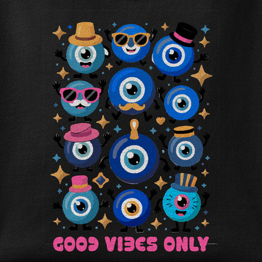 Close-up of the Good Vibes Evil Eyes print showing ink detail on the fabric