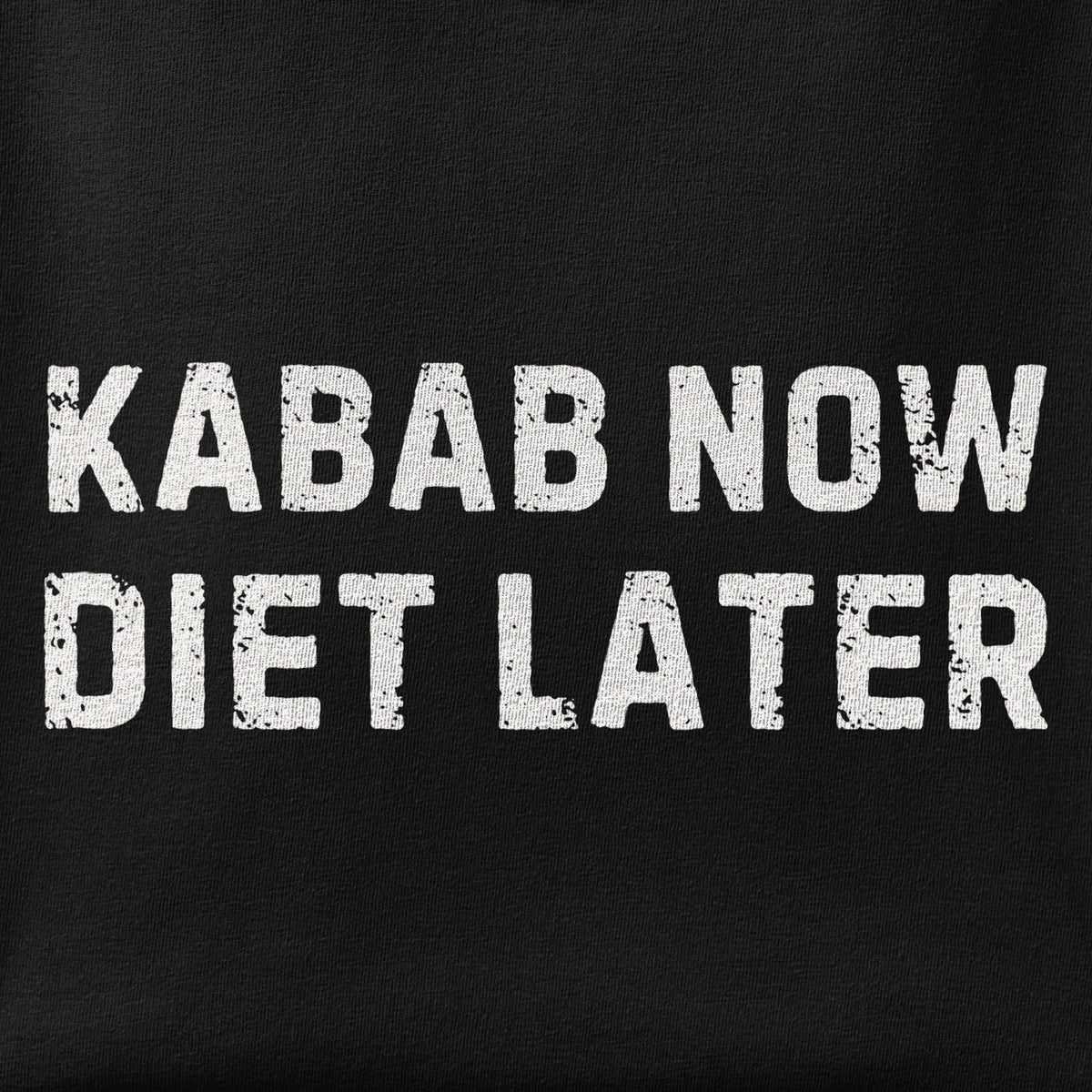 Close-up of the Kabab Now, Diet Later print showing ink detail on the fabric