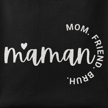 Close-up of the Maman - Mom, Friend, Bruh print showing ink detail on the fabric
