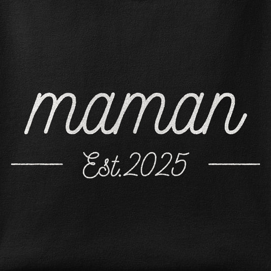 Close-up of the Maman, Est 2025 print showing ink detail on the fabric