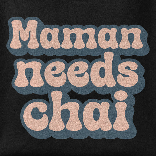 Close-up of the Maman Needs Chai print showing ink detail on the fabric