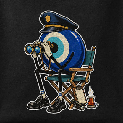 Close-up of the Nazar Guard print showing ink detail on the fabric