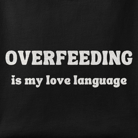 Close-up of the Overfeeding Is My Love Language print showing ink detail on the fabric
