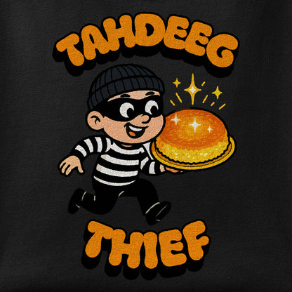 Close-up of the Tahdeeg Thief print showing ink detail on the fabric