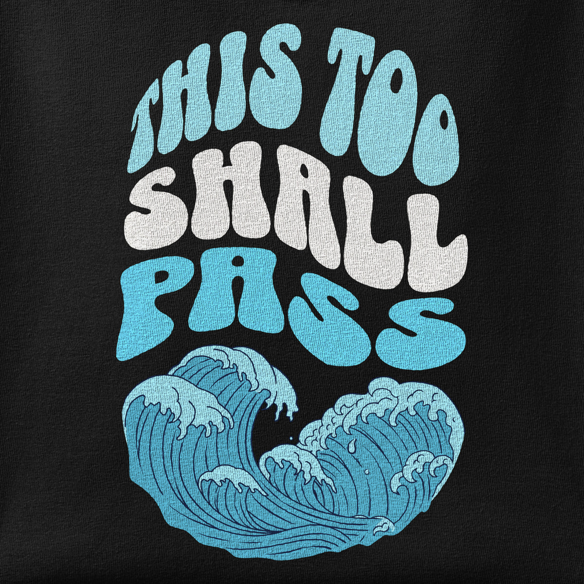 Close-up of the This too shall pass print showing ink detail on the fabric