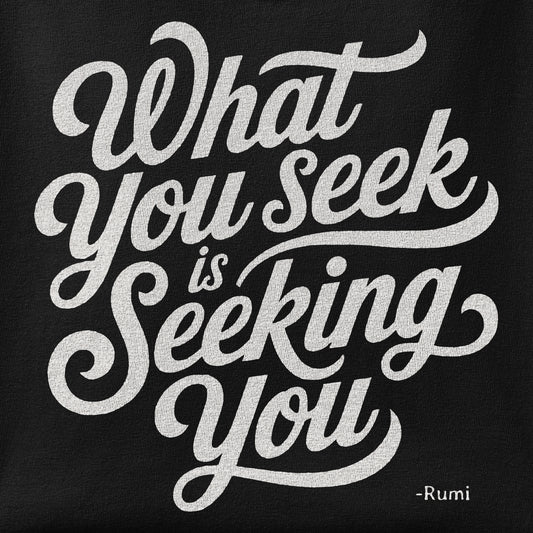 Close-up of the What you seek is seeking you - Rumi print showing ink detail on the fabric