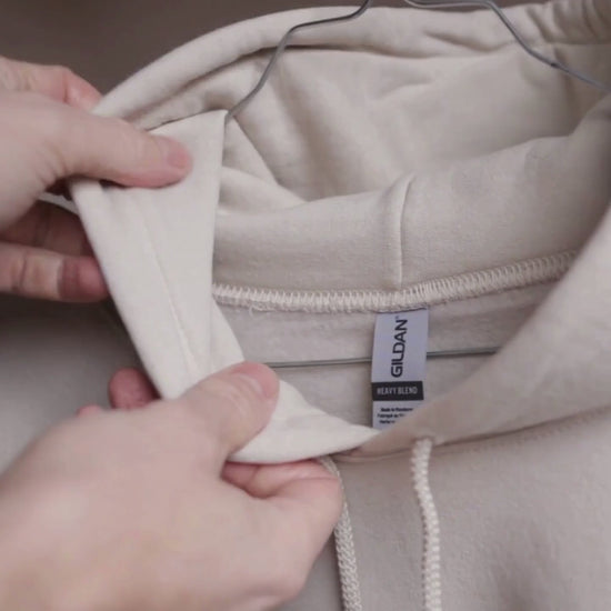 Hoodie close-up video: fabric, collar, stitching and fit